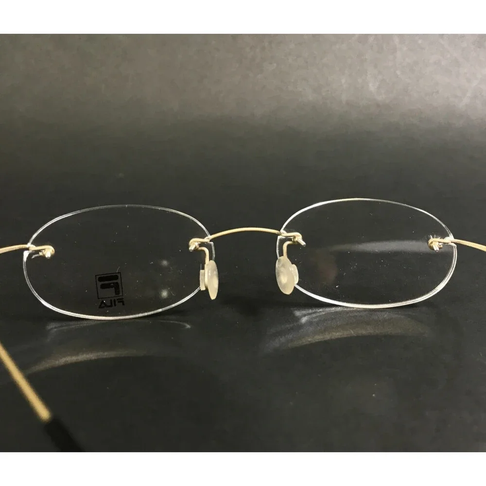 Vintage Fila Eyeglasses Frames Mod. VF8185 col. 648 Titanium Flex Gold 49-17-140